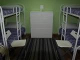 Верхнее спальное место на двухъярусной кровати в общем номере для мужчин