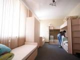 Спальное место на двухъярусной кровати в общем номере для женщин