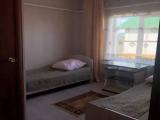 Двухместный номер с 2 отдельными кроватями и ванной комнатой