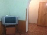 Трехместный номер эконом-класса с общей ванной комнатой