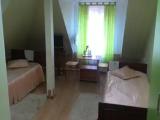Двухместный номер с 2 отдельными кроватями и общим туалетом