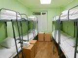 Спальное место на двухъярусной кровати в общем номере для женщин