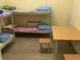 Спальное место на двухъярусной кровати в общем номере для мужчин