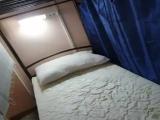 Спальное место на двухъярусной кровати в общем номере для мужчин 