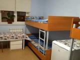 Спальное место на двухъярусной кровати в общем номере для женщин