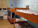 Спальное место на двухъярусной кровати в общем номере для женщин