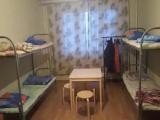 Спальное место на двухъярусной кровати в общем номере для мужчин