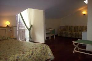 Отель «Albergo Il Cacciatore», Спелло