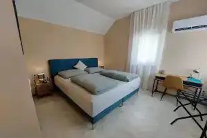 Buk City Apartments, Бюк