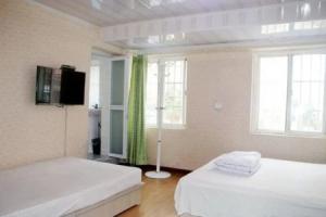 Island Hostel, Циндао