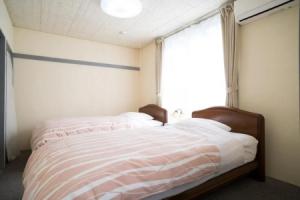 Enoshima Apartment Hotel, Фудзисава