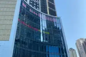 Ganghui Four Seasons Hotel Apartment (Dalian Railway Station Zhongshan Square), Далянь