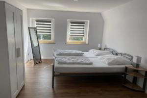 Ferienwohnung mit Balkon und Garten OG, Фленсбург