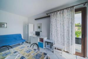 Porto 7B in a panoramic position with pool above the town of Porto Azzurro-IL PORTO CASA LEO, Порто-Аццурро
