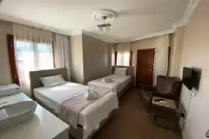Мини-отель «Mai Otel Cunda», Айвалык