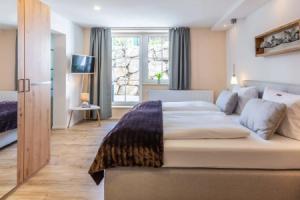 Ferienwohnung "Hirschbergsuite" am Schliersee mit Frühstück - 2min zum See mit Sauna & Frühstück, Шлирзее