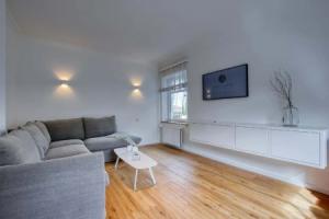 Landhaus Am Ufer - Wohnung 3, Хайлигенхафен