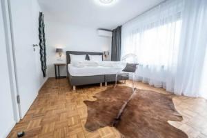 City Apartments FN L 6 KLIMATISIERT mit Balkon - Deluxe Doppelzimmer, Фридрихсхафен