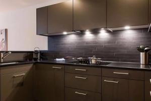 TITLIS Resort Wohnung 211, Энгельберг