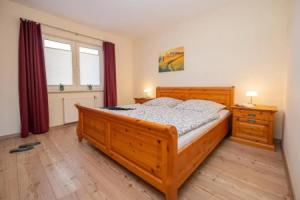 Wohnung 4 im EG Haus Stranddistel, komfortable Ferienwohnung fur 3 Personen in Zingst, Цингст