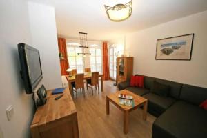 Haus Meeresblick - Ferienwohnung Strandmuschel, Остзеебад Баабе