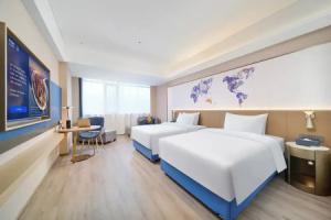 Kyriad Marvelous Hotel (Dongguan Huayang Lake University City Store), Дунгуань