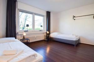 Tolstov Apartments - 1-4 Room Apartments - 20 min DUS Airport & MESSE DUS, Нойс