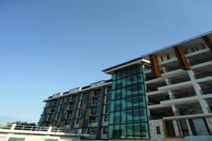 Izen Budget Hotel & Residence, Районг
