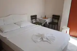 Devran Buti̇k Otel, Гумулдур