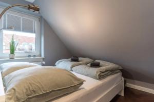 Charmante Ferienwohnung, Бюзум