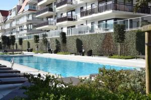 Duplex Villa Capricia appartement met zwembad, Ньивпорт