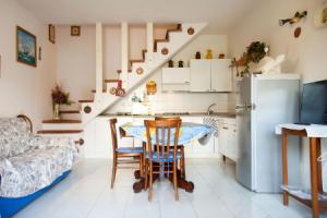 Trilocale Azzurro with small garden-TRILOCALE AZZURRO, Порто-Аццурро