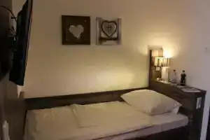 stadthotel miya, Бад-Мергентхайм