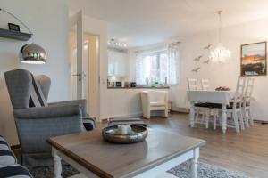 Strandhäuser Lindenstraße Wohnung 1, Келленхузен