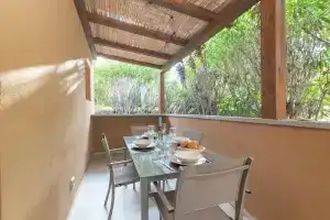 White Sand House in Portisco, Портиско
