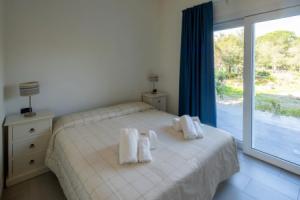 Welcomely - Porto Corallo Seafront, Кала Либеротто