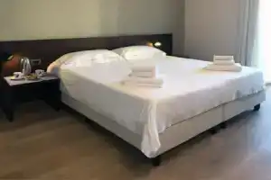 Hotel «Corallo», Империя