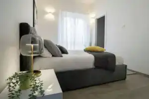 Charming and Modern Three-bedroom Apartment in the Heart of the City of Asti, Асти