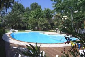 Hotel Àvila, Джулианова