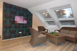 Ostfrieslands Perle Ferienwohnung an der Nordseeküste, Sauna, Terrasse, Garten, ruhige Lage, WLAN, Норден