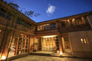 Qingsha Hostel · Xige, Дали