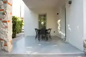 Appartamento con giardino Le Querce, Систиана