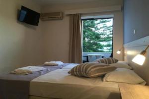 Apollon Hotel, Сития