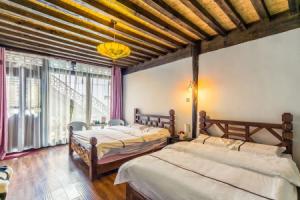 Bai Qi Guest House, Лицзян