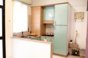 Casmene Apartment, Комизо