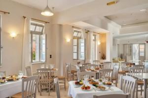 Lume D'oro Syros, Кинион