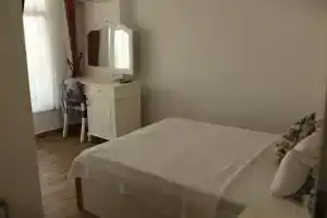 Sahil otel, Унье