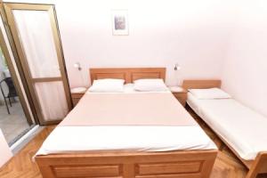 Rooms Tom, Малинска