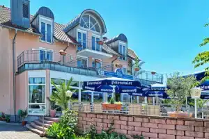 Hotel «Mythos», Руст