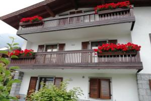 Appartamento con giardino, Каризоло